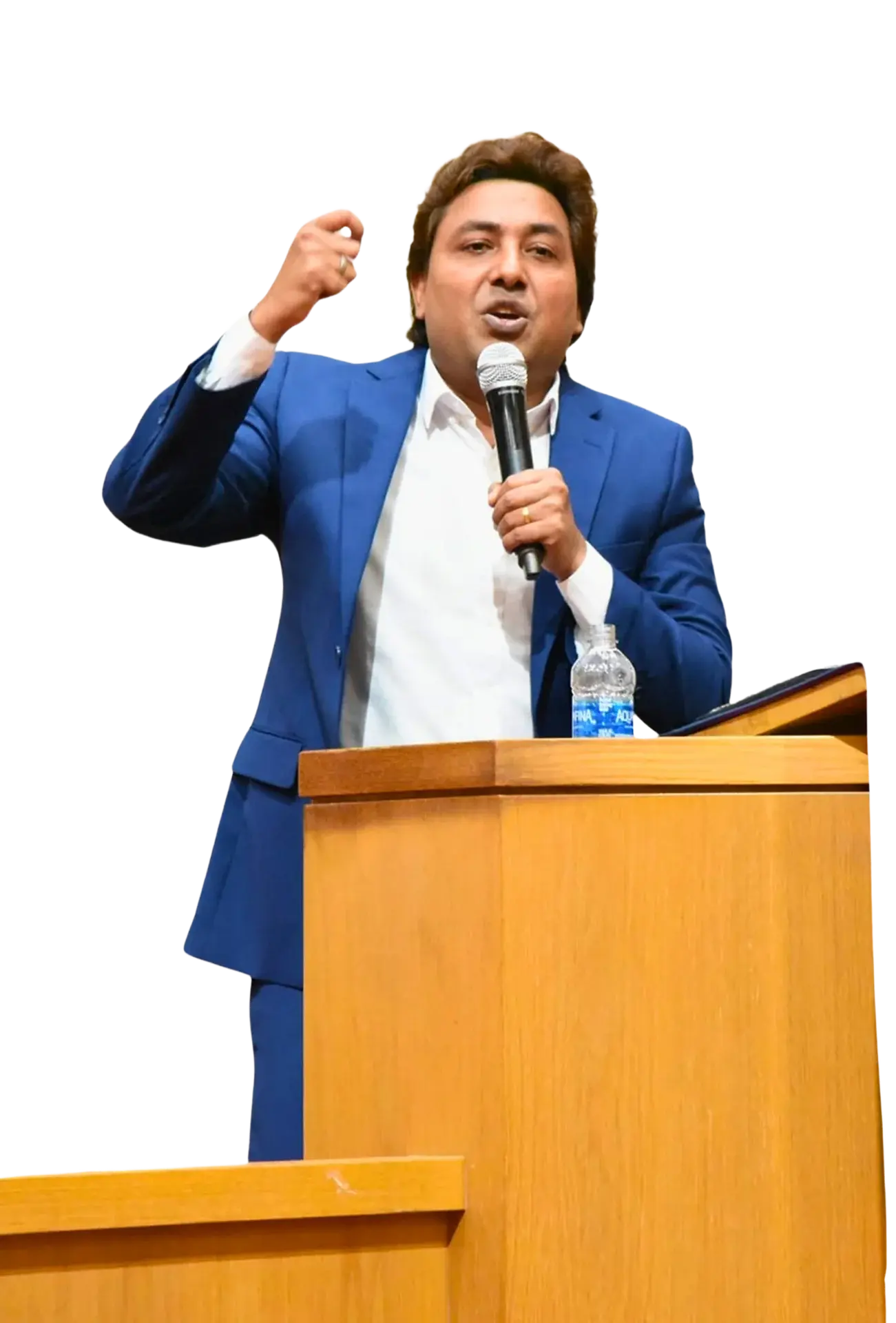 Pastor Victor M. Sidhu speaking at a microphone