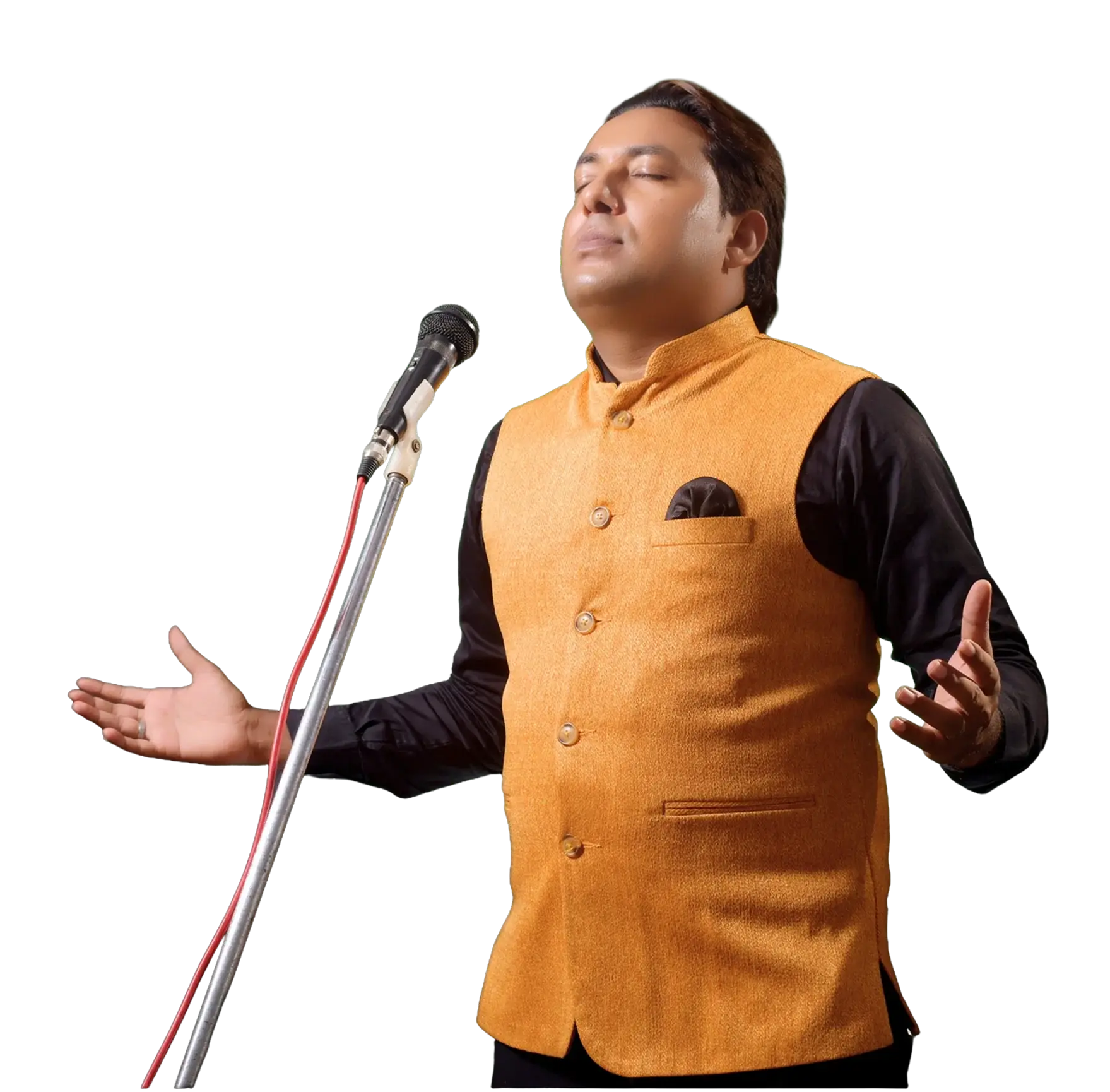 Pastor Victor M. Sidhu worshipping at a microphone